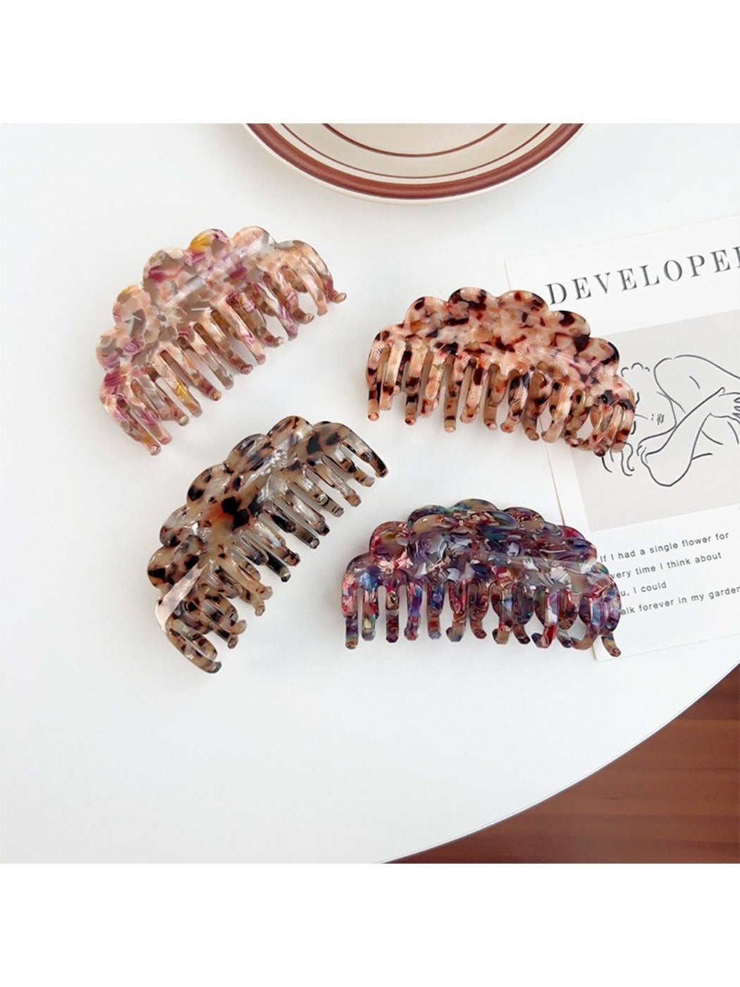Close-up of Beau double row wavy claw clip showing curved teeth