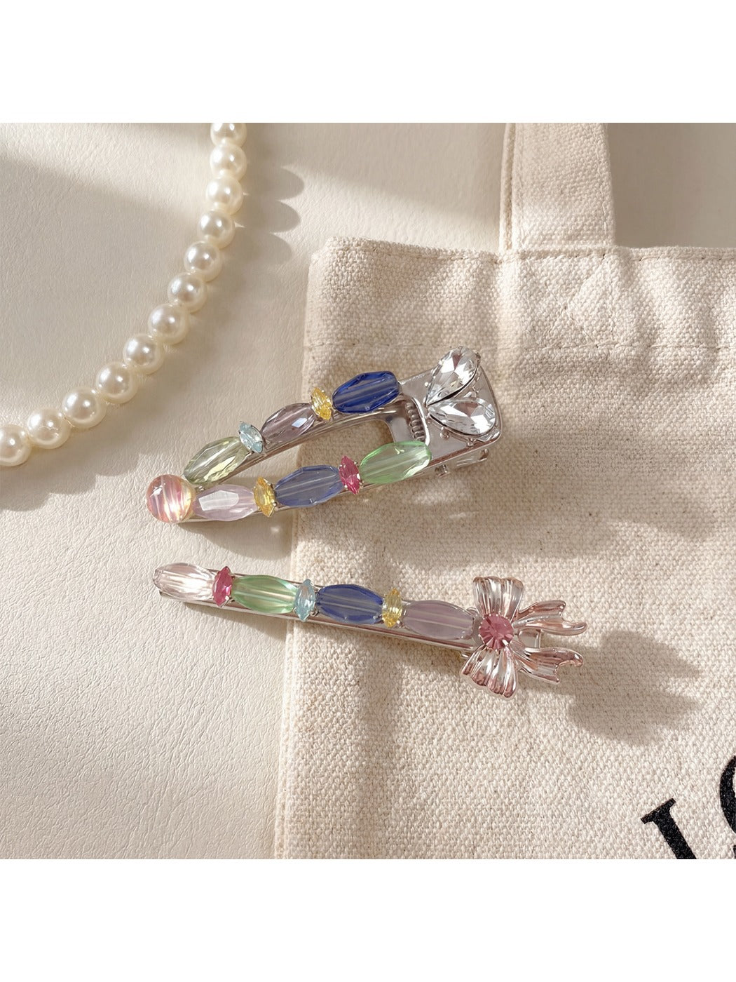 Beau hair clip worn in blonde hair, highlighting its vibrant pastel colors and floral design