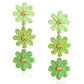Colorful flower shaped drop earrings worn on a model's ear