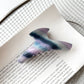 Beau hair claw clip positioned diagonally on plain background