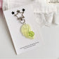 Keypus - Glitter Wing Four Leaf Clover Acrylic Keychain