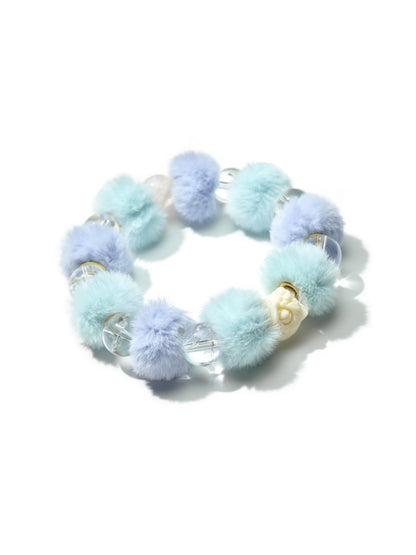 Close-up of Lovra beaded bracelet showing detailed pastel beads and elastic band