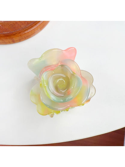 Top view of Beau flower-shaped claw clip displaying symmetrical petal arrangement