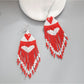 Earedge - Festive Heart Tassel Drop Earrings
