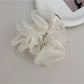 Gifty double layer ruffled scrunchie styled in a ponytail