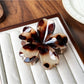 Beau claw clip with leopard print viewed from above