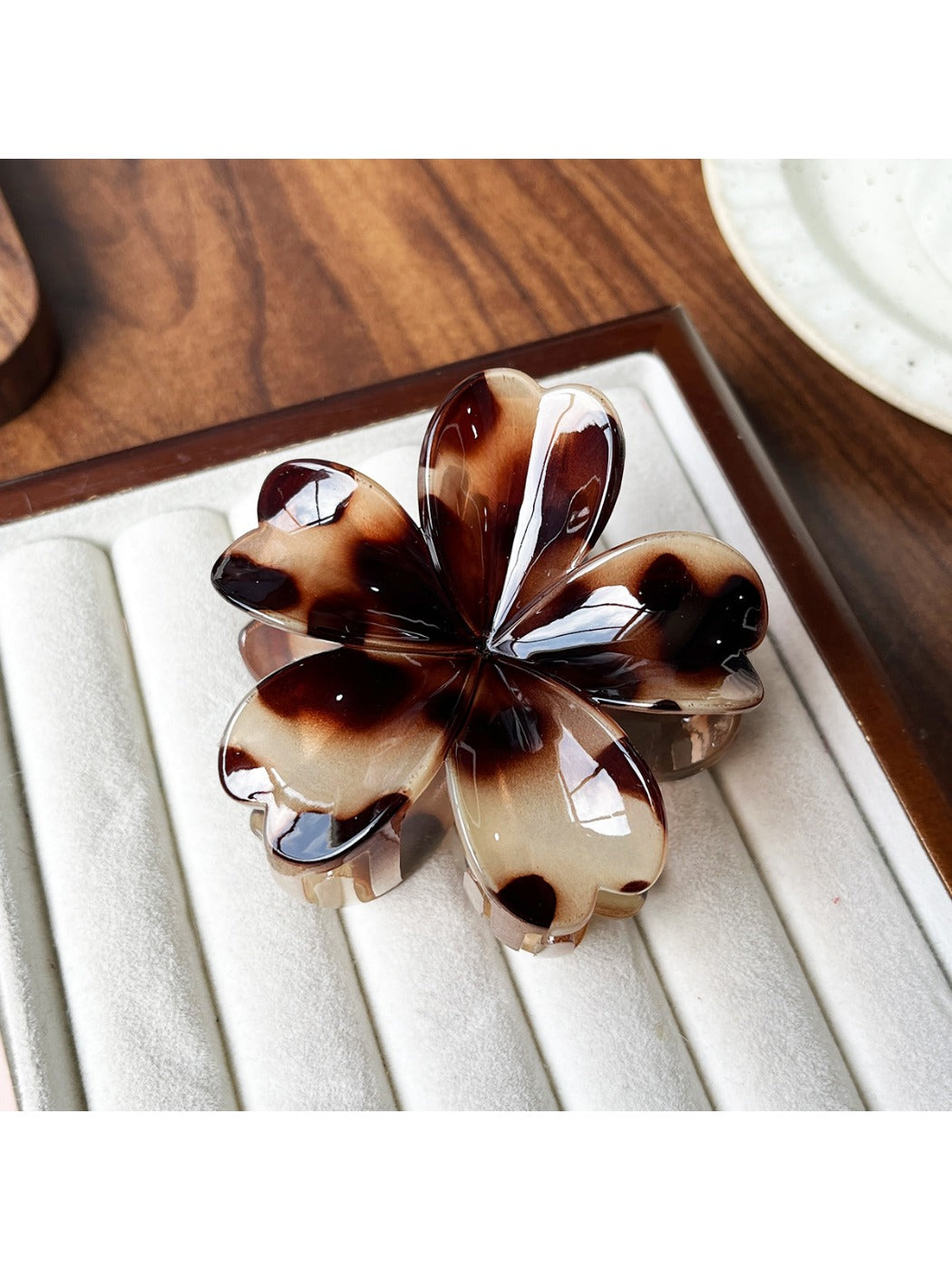 Beau claw clip with leopard print viewed from above