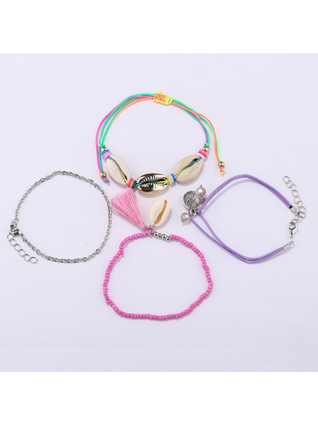 Close-up of Lovra multi-row bracelet showing detailed beadwork and silver charms