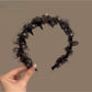 Chic leopard print tulle headband with bow detail on white background