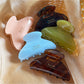 Beau Sweet Chic acetate claw clip holding a section of brown hair