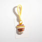Keypus keychain packaging showing French fries and coffee cup design