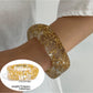 Lovra stackable bracelet presented in a jewelry box with soft lighting