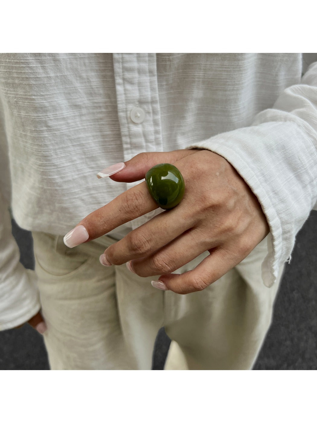 Lovra open cuff bracelet and ring styled together on a model's hand