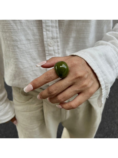 Lovra open cuff bracelet and ring styled together on a model's hand