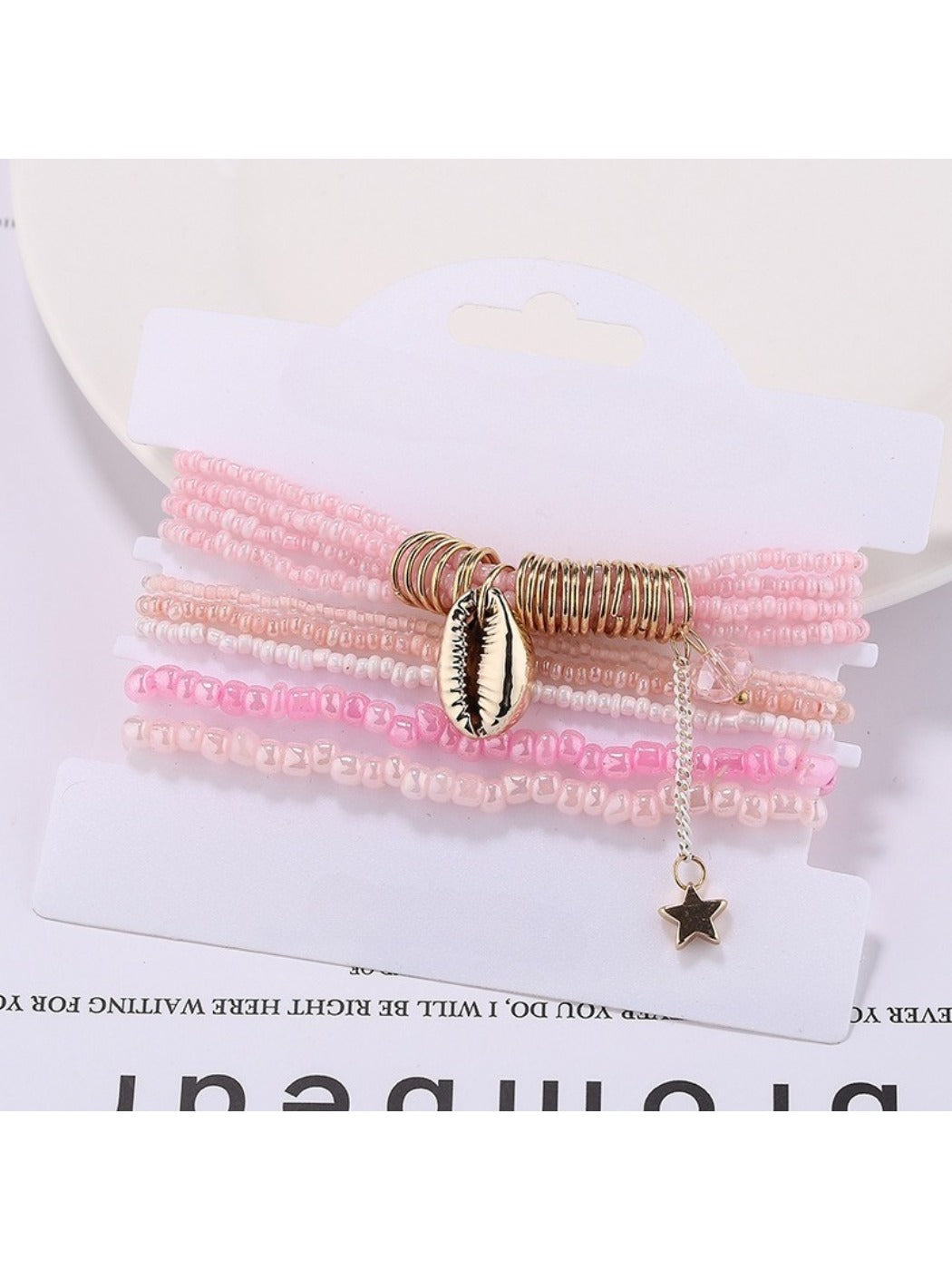 Lovra bracelet with multiple strands of colorful beads arranged in layers