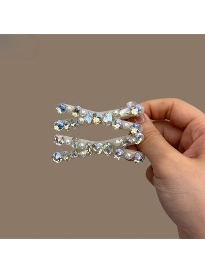 Close-up of Beau sparkly crisscross bar hair clip highlighting glitter details