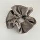 Model wearing Gifty satin finish scrunchie styled with loose hair