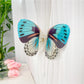 Beau butterfly hair claw clip displayed alongside matching hair accessories