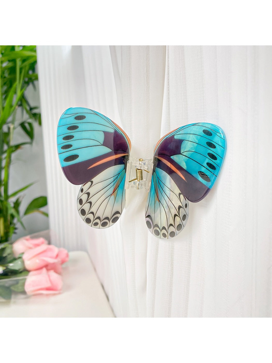 Beau butterfly hair claw clip displayed alongside matching hair accessories