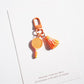 Set of multiple badminton racket keychains in different colors arranged together