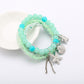 Lovra multi-row beaded bracelet styled with casual outfit on model's wrist