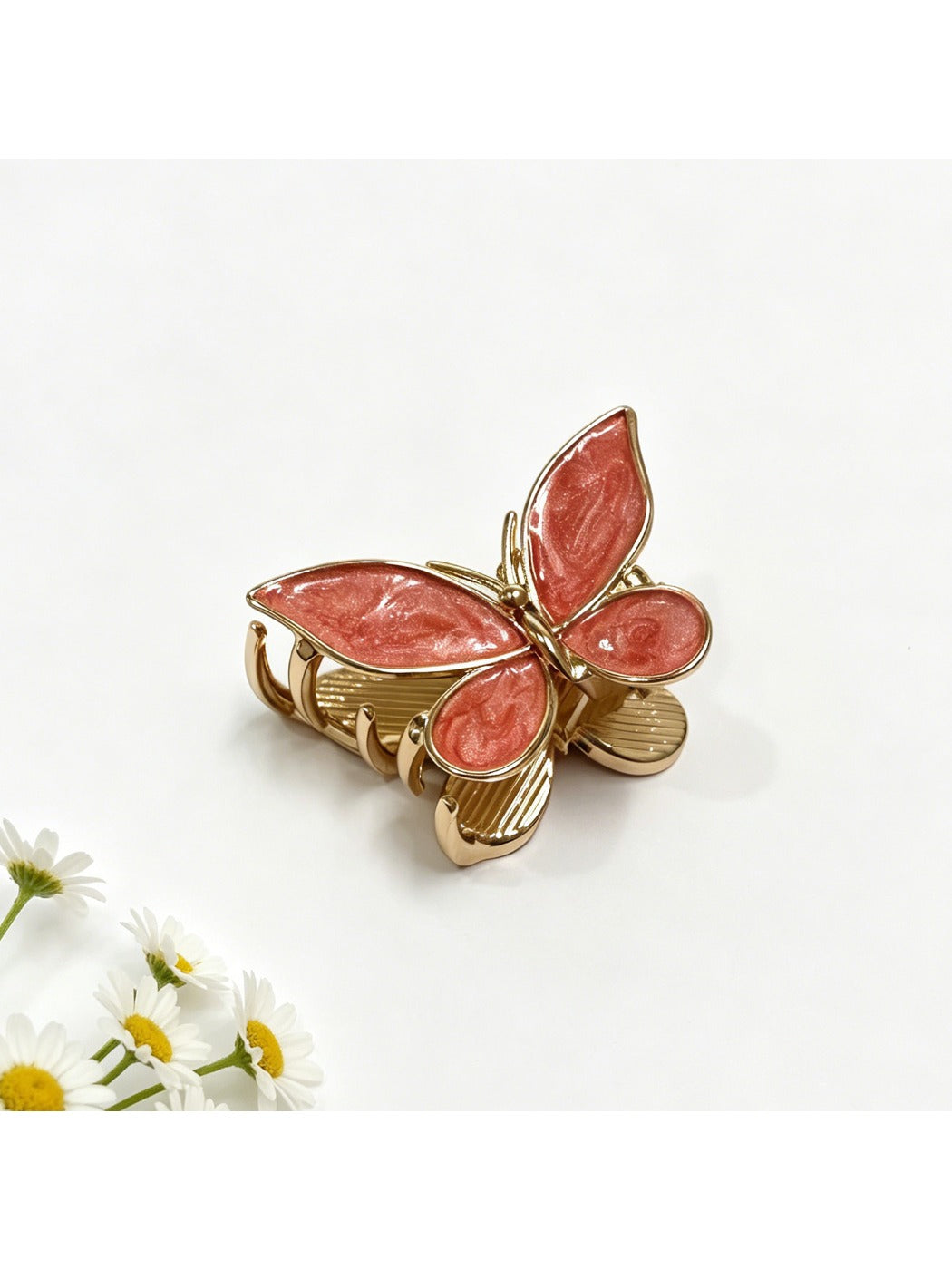 Beau butterfly hair clip securing medium-length hair on a model