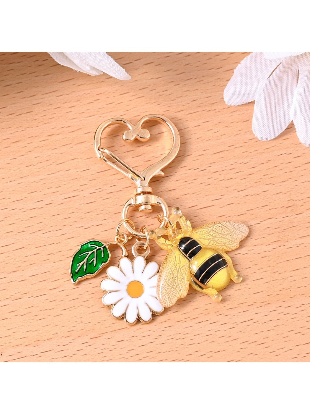 Alloy bee keychain displayed on a white background highlighting its shiny finish