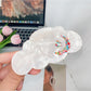 Top view of Beau cloud shaped hair claw clip displaying its symmetrical design