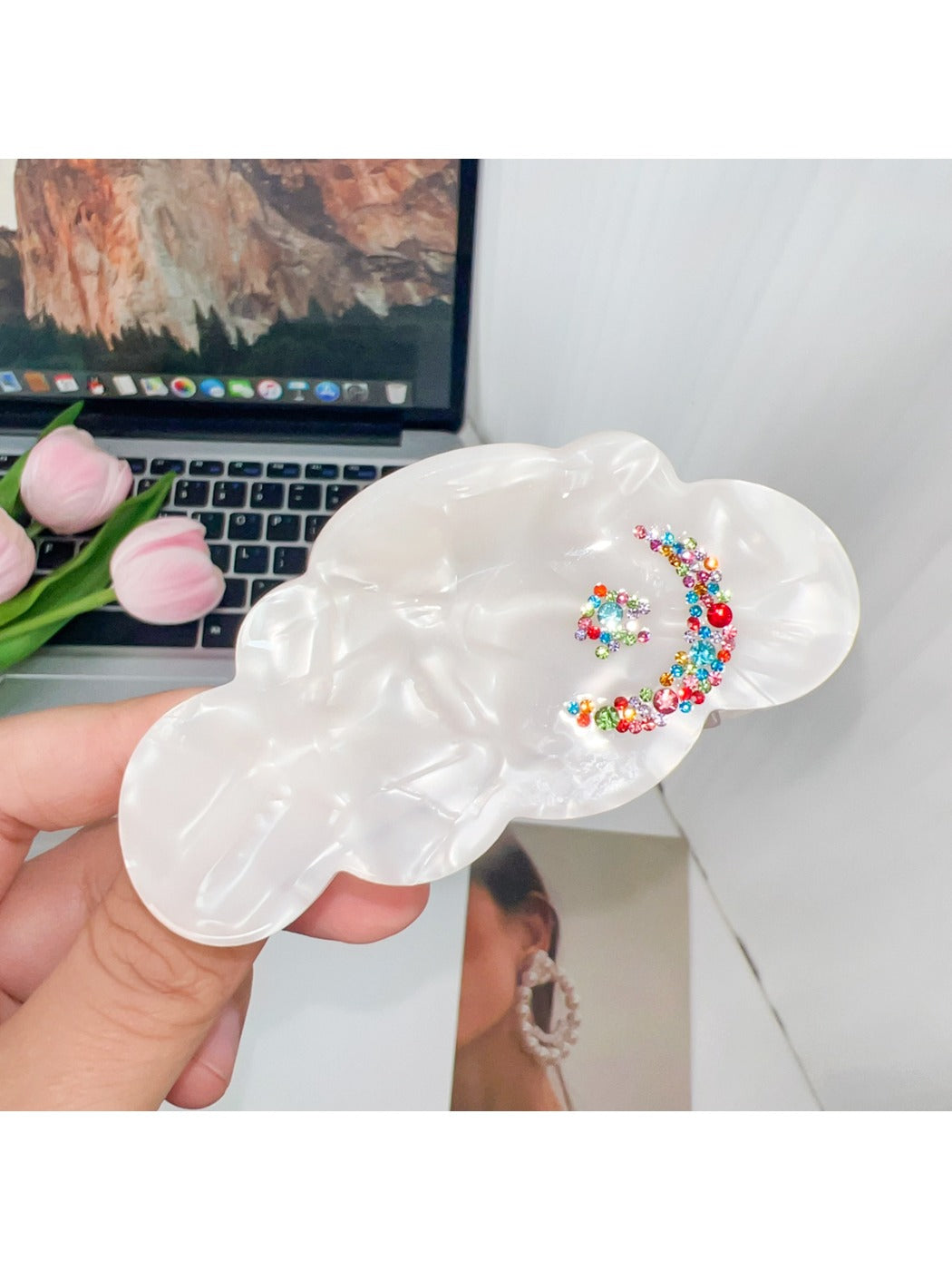 Top view of Beau cloud shaped hair claw clip displaying its symmetrical design