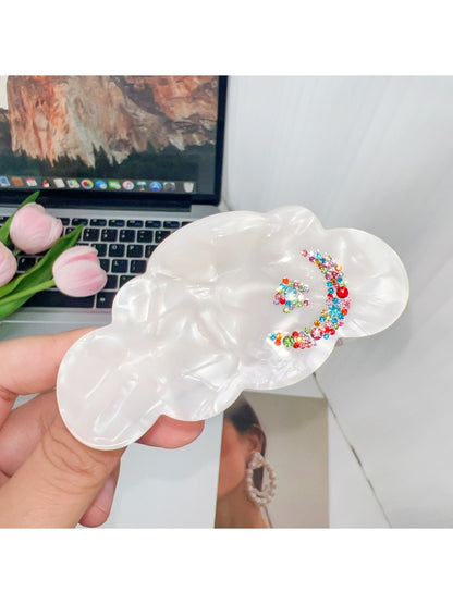 Top view of Beau cloud shaped hair claw clip displaying its symmetrical design