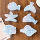Beau blue ocean style claw clip on white background showing front view