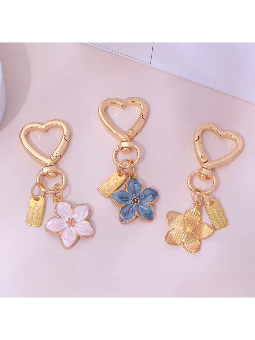 Keypus floral charm keychain displayed on a white background