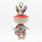 Keypus fabric doll keychain held in hand to show size and scale