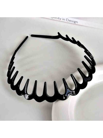 Top view of Gifty toothed wave headband displaying symmetrical wave design