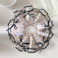 Gifty satin polka dot bow scrunchie displayed on a white background
