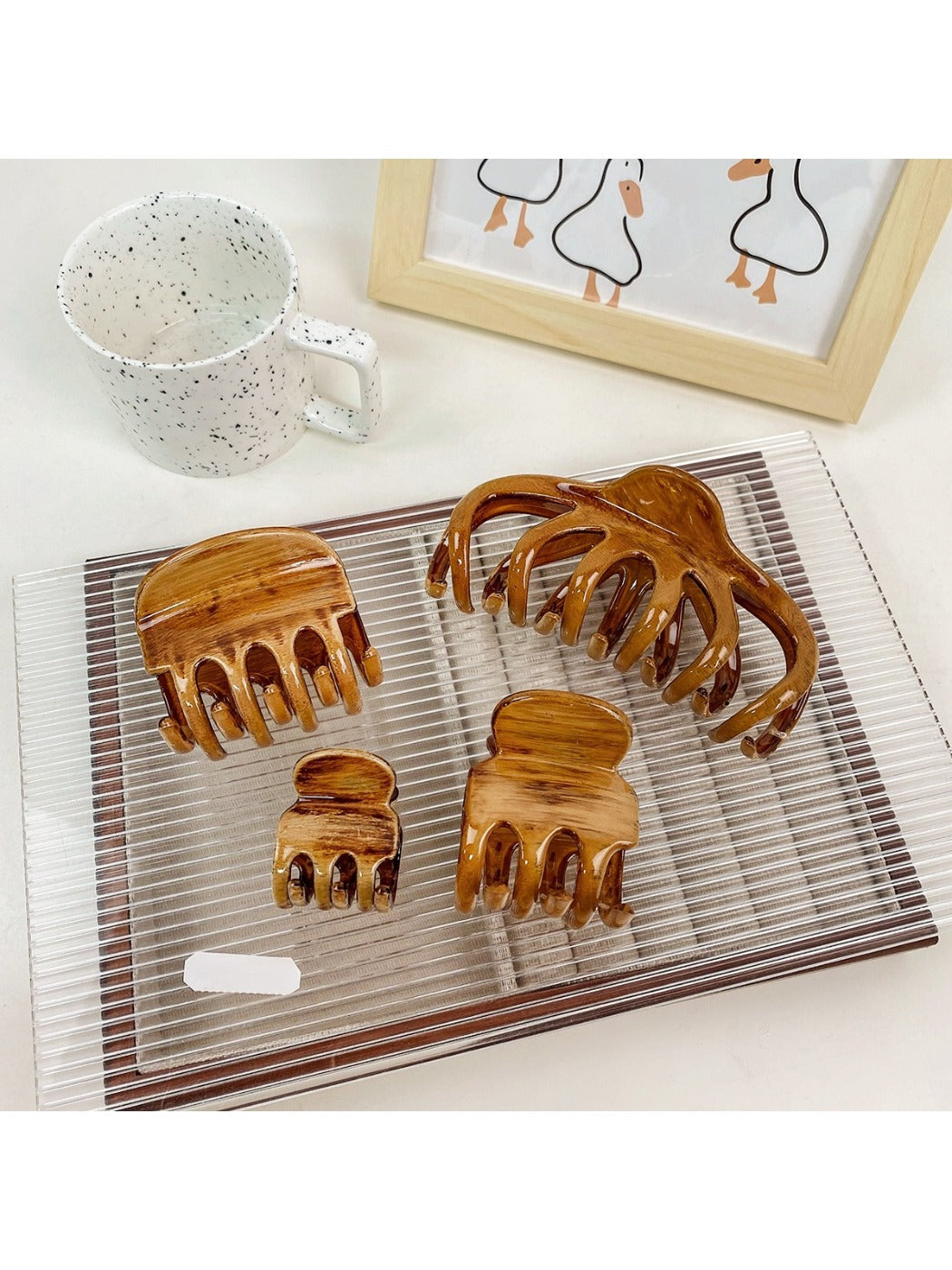 Beau hair claw clip open, displaying inner teeth and spring mechanism