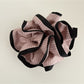 Multiple Gifty Neat Silky Zesty Scrunchies stacked to show consistent color and texture