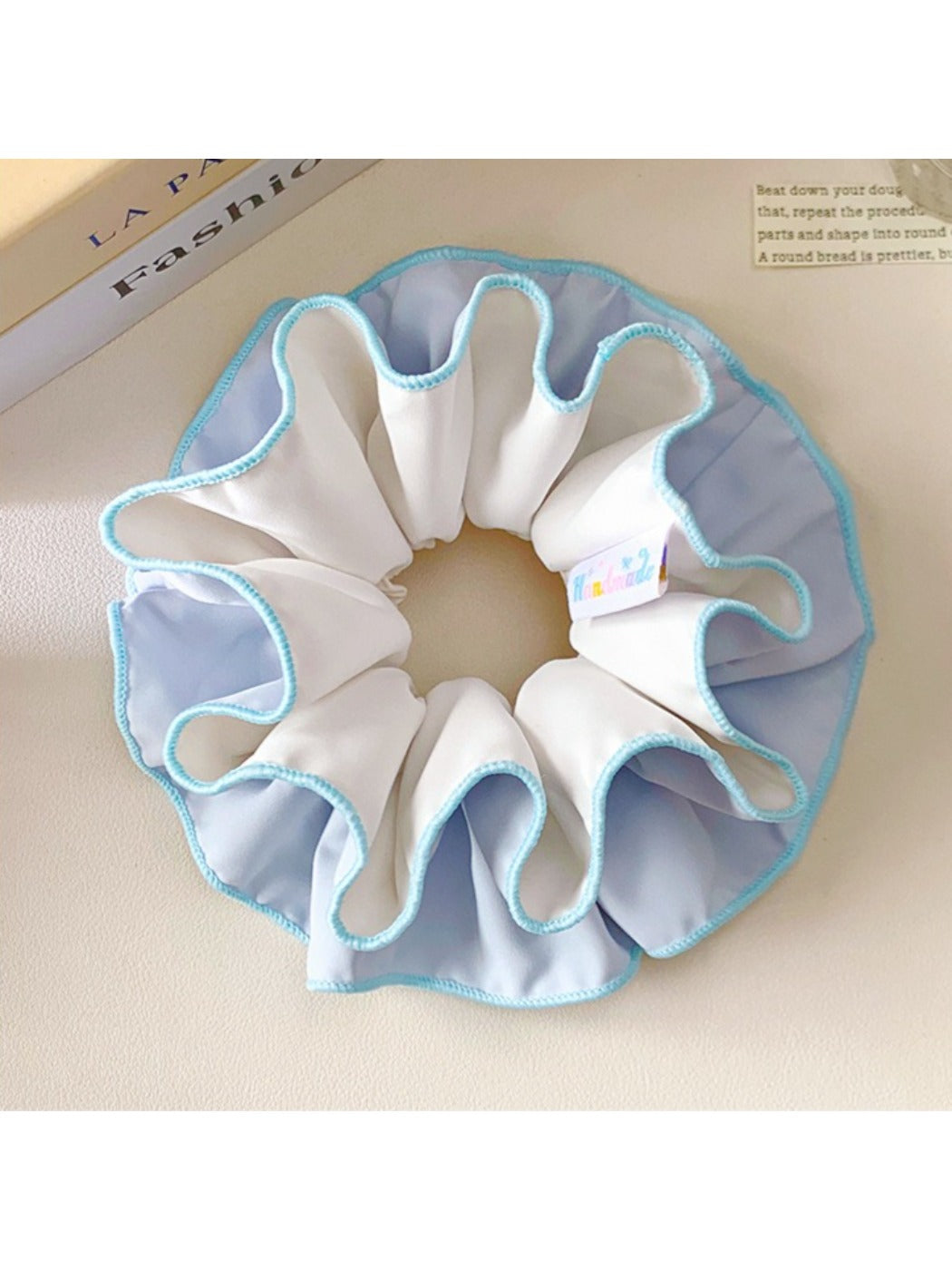 Blue double layer scrunchie styled with casual outfit
