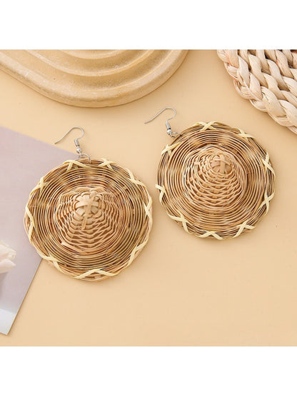 Earedge earrings styled with casual summer outfit on wooden surface