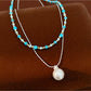 Nozari - Layered Beaded Round Pendant Necklace