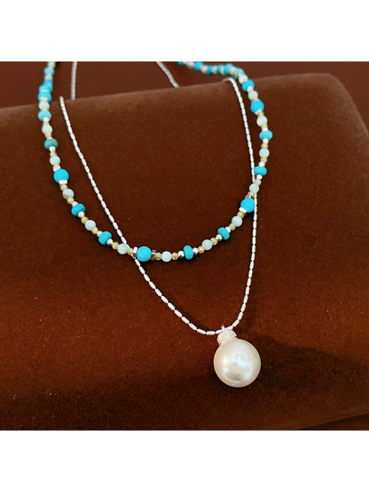 Nozari - Layered Beaded Round Pendant Necklace