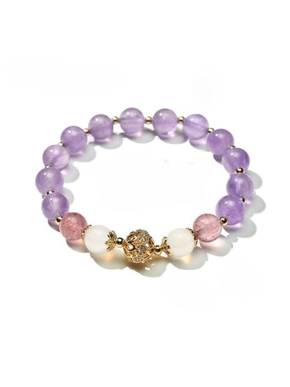 Detailed shot of clasp and beads on Lovra vintage purple beaded bracelet