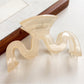 Beau hair claw clip securing half-up hairstyle on model