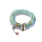 Lovra chic layered beaded bracelet coiled to display its colorful design