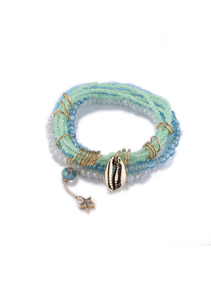 Lovra chic layered beaded bracelet coiled to display its colorful design