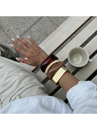 Lovra Chic Irregular Bangle Bracelet worn on wrist with casual outfit