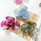 Close-up of Beau Sweet Acetate Medium Flower Claw Clip showing flower pattern and clasp