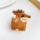 Beau minimalist animal hair claw clip displayed with packaging box