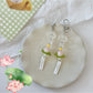 Lotus-shaped metal wind chime keychain with intricate petal design