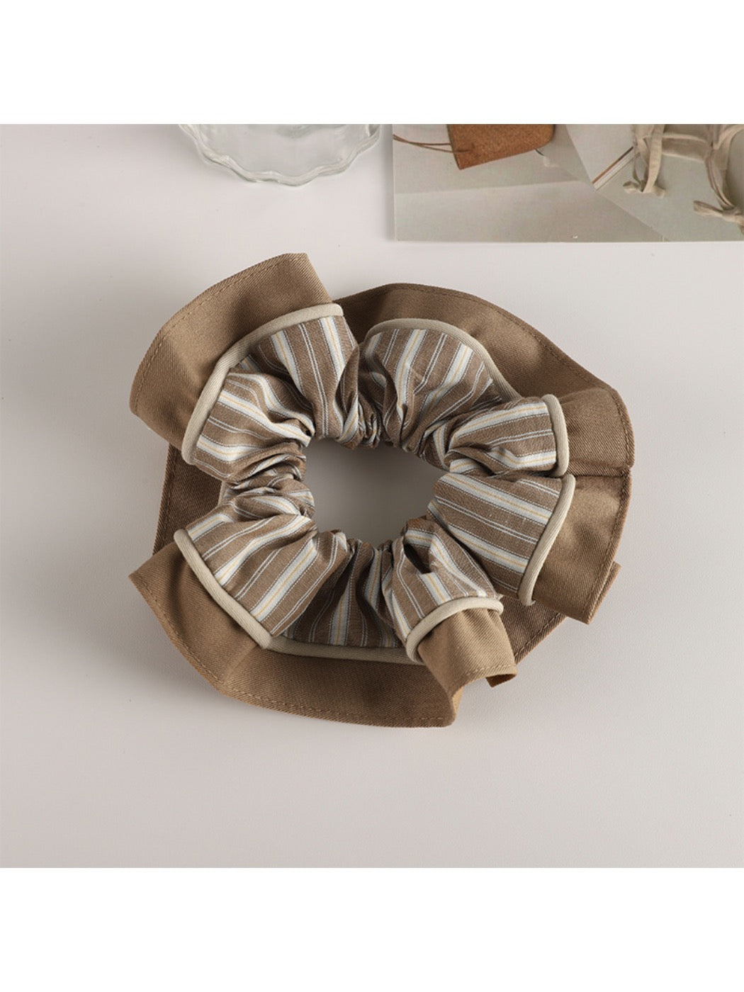 Gifty pastel scrunchie displayed on a white background highlighting its soft fabric